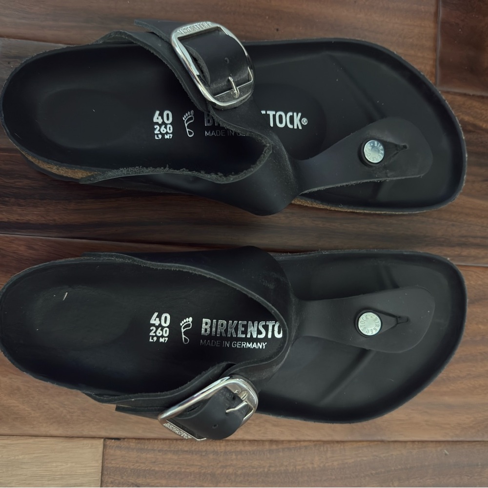 Birkenstock Black Thong Sandals with Metallic Buckles